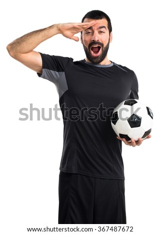 Football player showing something