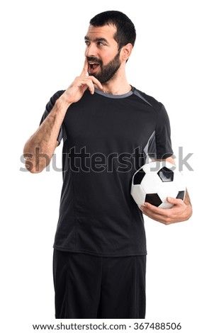 Football player doing surprise gesture