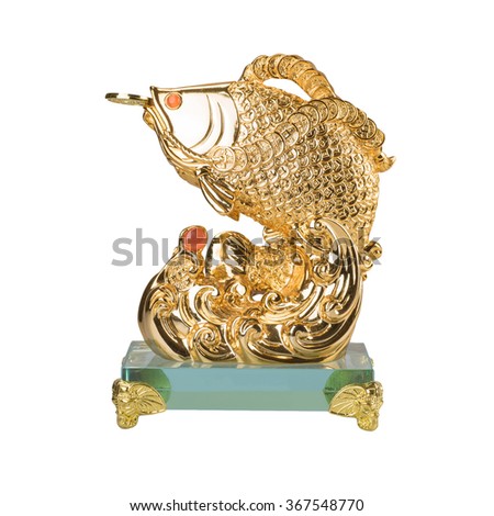 Golden fish sculpture  isolated on the white background. Chinese decoration object for good luck meaning