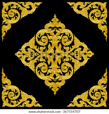 Pattern of wood carve gold paint for decoration on black background