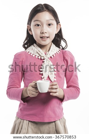 A girls(woman, female) wearing pink blouse and skirt hold a blank(empty) small coffee cup with smile(happy) isolated white at the studio.