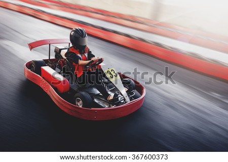 Go kart speed rive indor race opposition race Royalty-Free Stock Photo #367600373