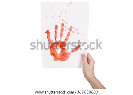 hand and a sheet on which a hand painted
