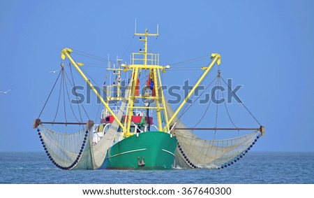 Crab Fishing Trawler at North Sea near Norderney Island,Lower Saxony,Germany Royalty-Free Stock Photo #367640300