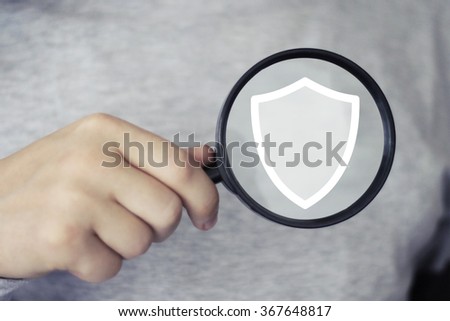 Businessman search loupe magnifier shield security virus web icon