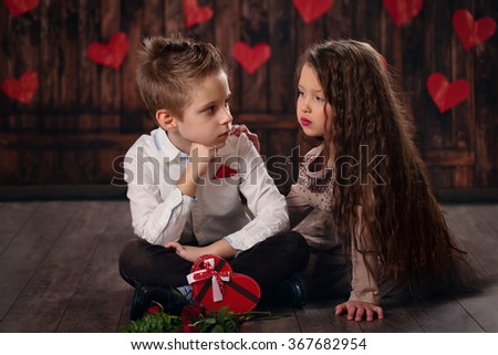 Girl and boy celebrating Valentines day.  