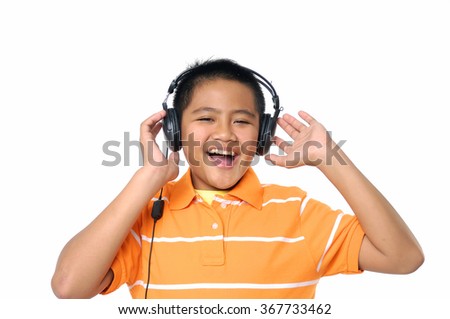 Teenage boy listening to music 