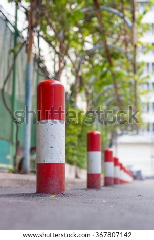 Road block pole in straight line