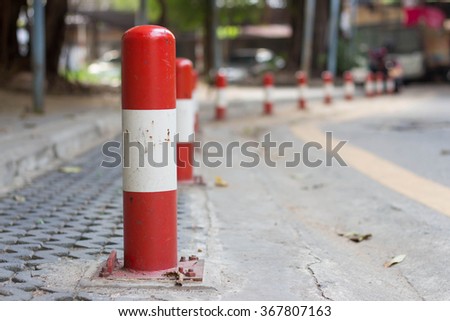 Road block pole in straight line
