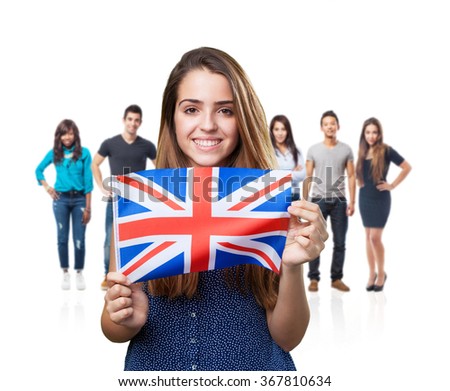 young woman holding an united kingdom flag on white