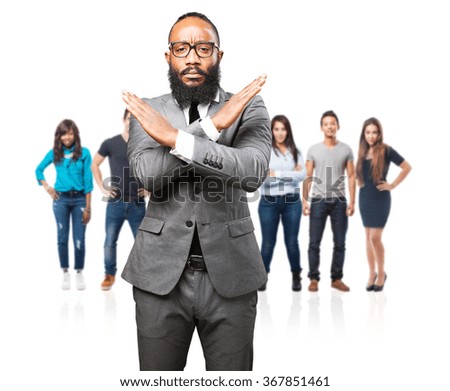 business black man doing a cross with arms