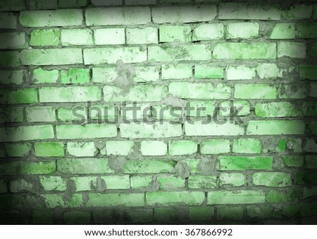 green brick wall background faded on black