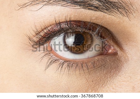 Close up image of female brown eye Royalty-Free Stock Photo #367868708