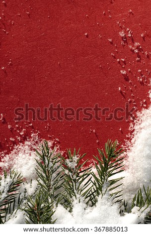 snow on red paper background
