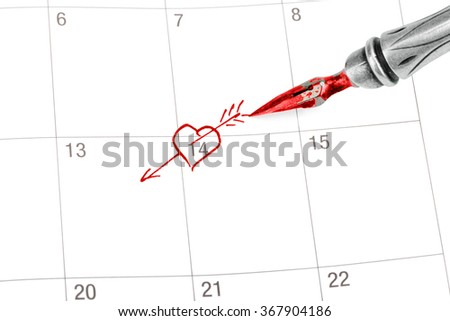 Point out Valentine's day in the calendar isolated on white