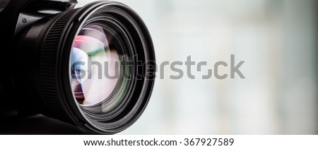 Closeup of a digital camera. Large copyspace