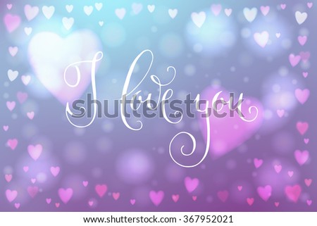 Abstract smooth blur purple background with heart-shaped lights over it and hand written I love you words.