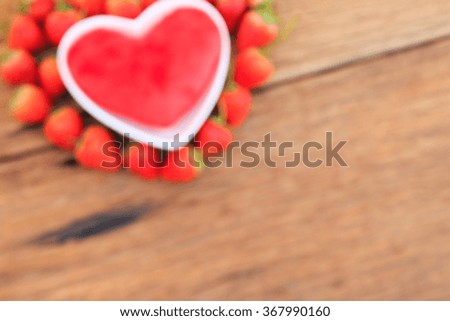 Blurred Red heart in heart shape bowl