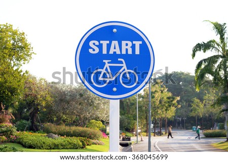 Bicycle sign in the public garden.