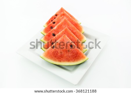 Red watermelon slices on white background