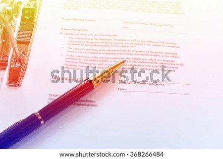 Signed a contract document,Selective focus on top of pen