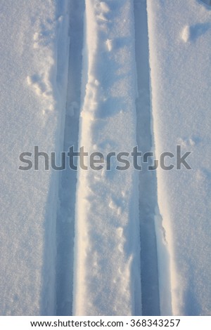 Ski-track at the snow desert. Picture can be used as a background