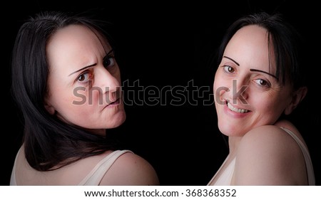 Split personality. Woman showing angry, irritated side and a caring, kind side. Black background with copy space. Royalty-Free Stock Photo #368368352