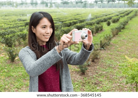 Asian Woman use of the camera