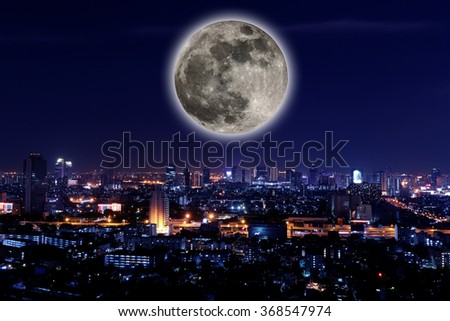 The View city at night with full moon.
