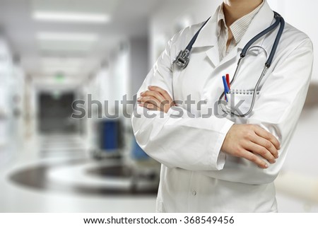 young woman doctor and interior of hospitla 