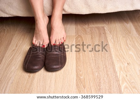 female feet and slippers