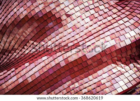 Detail of the futuristic red roof of the exhibition pavilion. Architectural element. Royalty-Free Stock Photo #368620619
