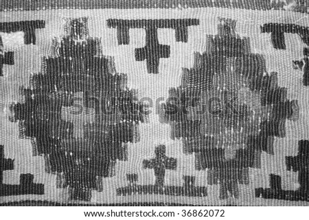 turkish carpet with pattern as background in grey color