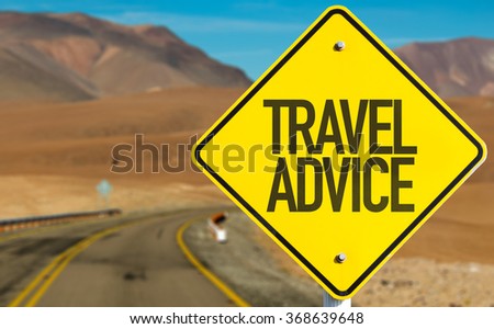 Travel Advice sign on desert road