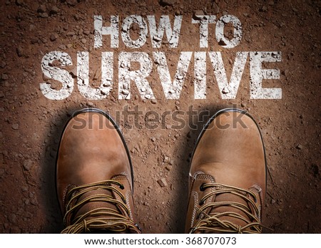 Top View of Boot on the trail with the text: How To Survive Royalty-Free Stock Photo #368707073