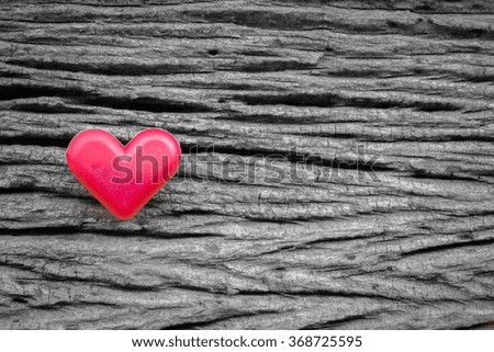 red heart on wooden