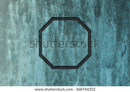Flat octagon on abstract grunge metal texture