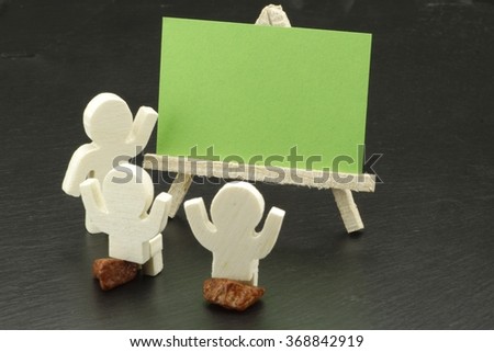 A group cheerful characters with blank card