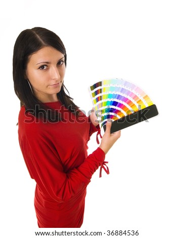 Stock photo of a young woman holding color guide
