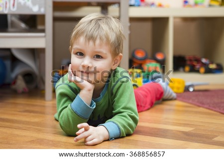 the child plays in the room Royalty-Free Stock Photo #368856857