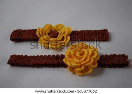Crocheted brown headbands with yellow flowers. Handmade. 