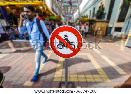 don't ride motorcycle on circle signage with maket background
