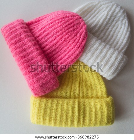 collection of knitted caps isolated 