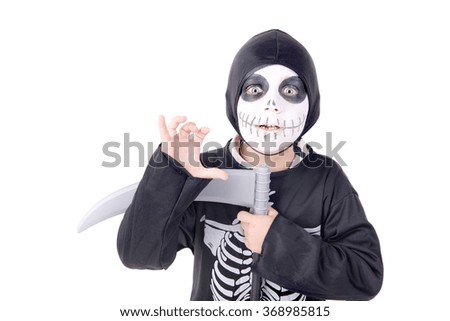 little boy dressed up for halloween isolated in white