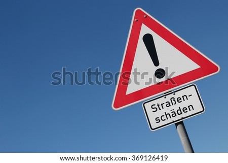 German road sign: caution - shaded road (translation: shaded road)