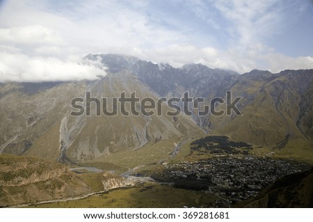 View of the mountain valley and settlement of Stepantsminda (Kazbegi).