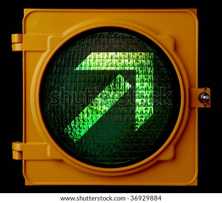 Traffic light indicating that motorist can make turn
