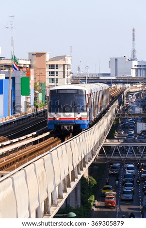 The Sky train in Bangkok with building