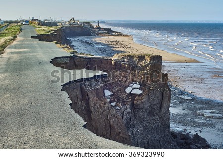 Coastal erosion of the cliffs at Skipsea, Yorkshire on the Holderness coast  Royalty-Free Stock Photo #369323990
