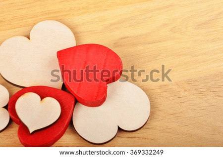 Red heart on wooden background, card for Valentine's day